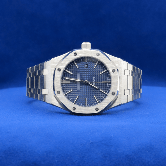 Front view of Luxury Blue Dial Masterpiece plain stainless steel watch with a bold and modern design.



