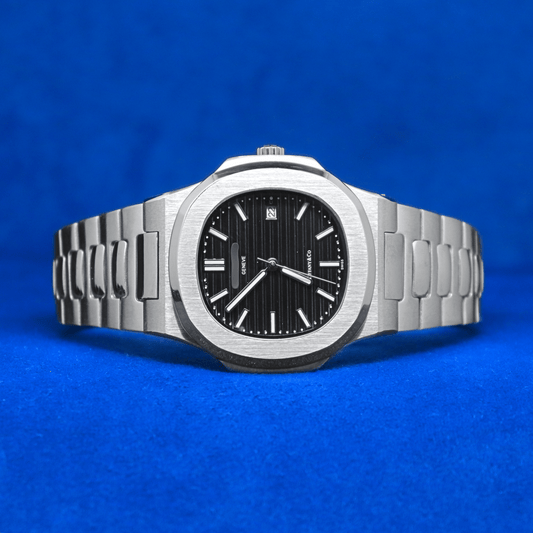 Front view of Nautilus Master Chrono plain stainless steel watch with a bold and modern design.


