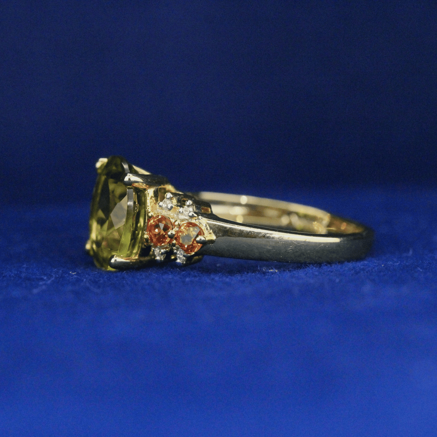 Left side view of Peridot Cocktail Ring with vibrant green gemstone – Fine jewelry

