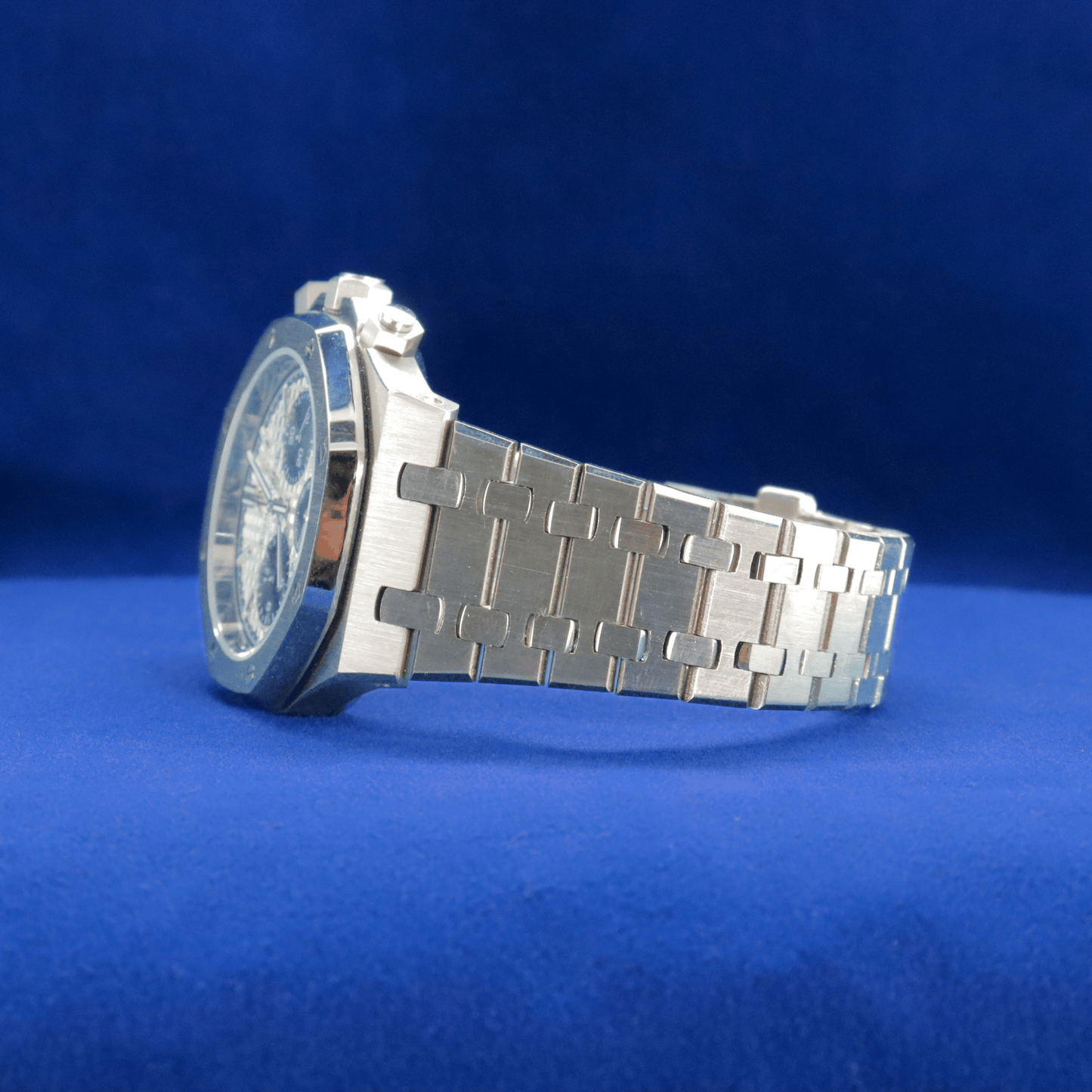 Left-side view of Precision Crafted Steel Sports Watch plain stainless steel watch, built for durability and style.

