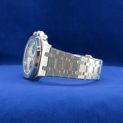 Left-side view of Precision Crafted Steel Sports Watch plain stainless steel watch, built for durability and style.


