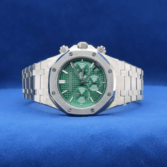 Front view of Royal Green Tapisserie Chrono plain stainless steel watch with a bold and modern design.


