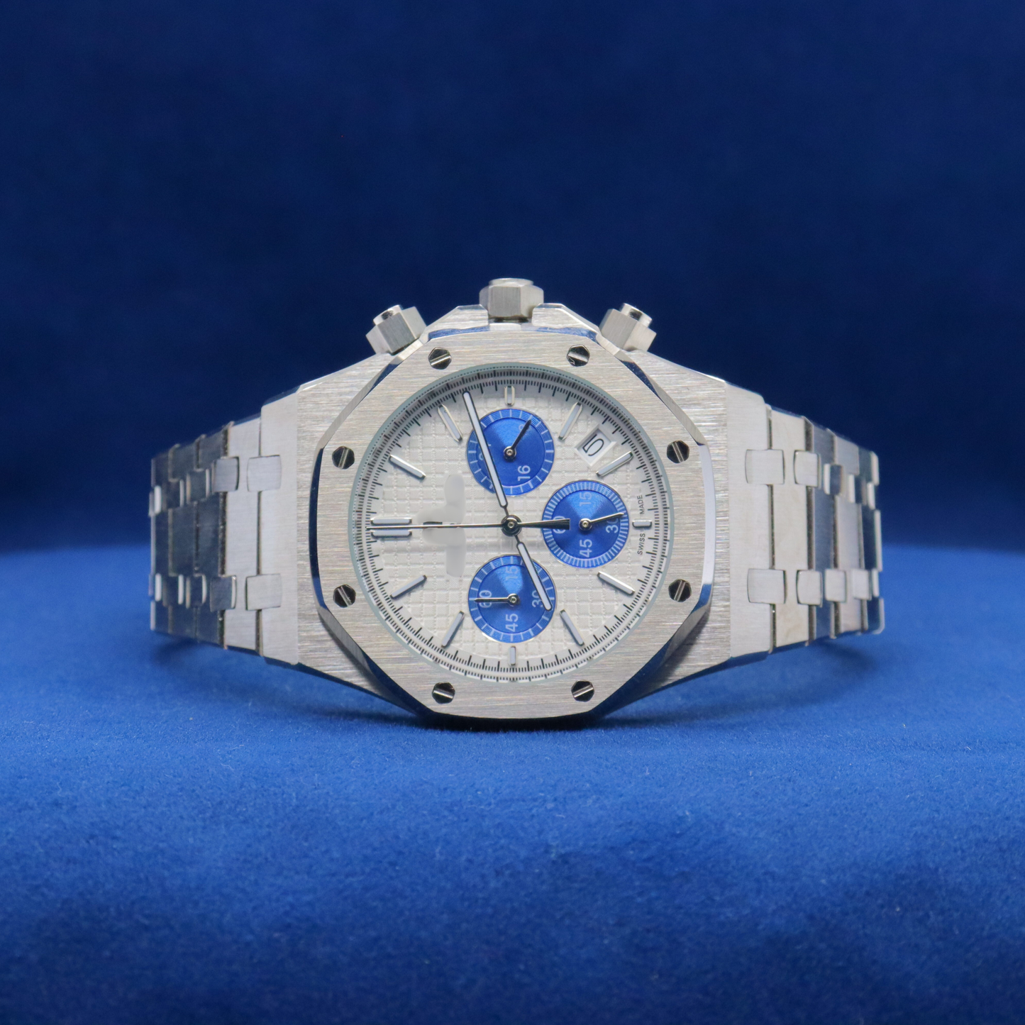 Front view of Royal Ice Blue Precision plain stainless steel watch with a bold and modern design.


