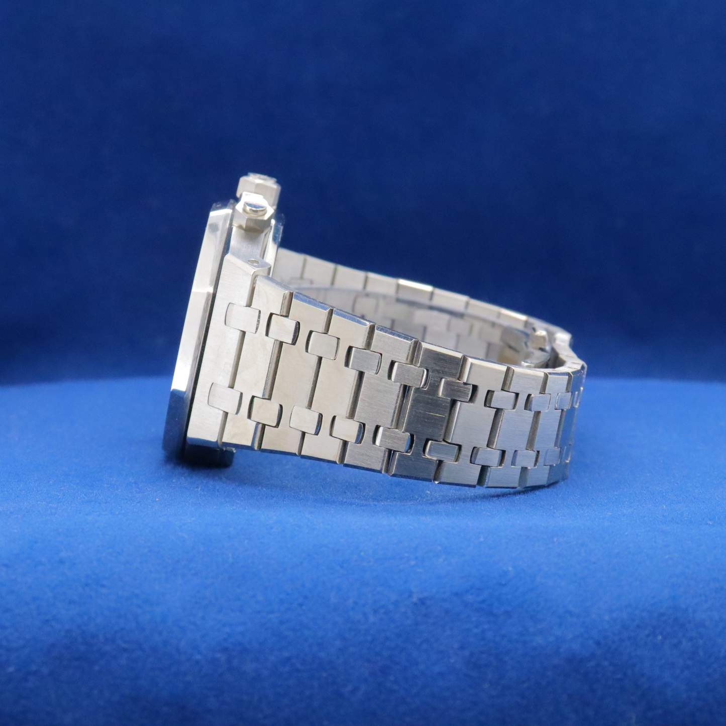 Right-side view of Royal Ice Blue Precision stainless steel watch, featuring a sleek and timeless look.


