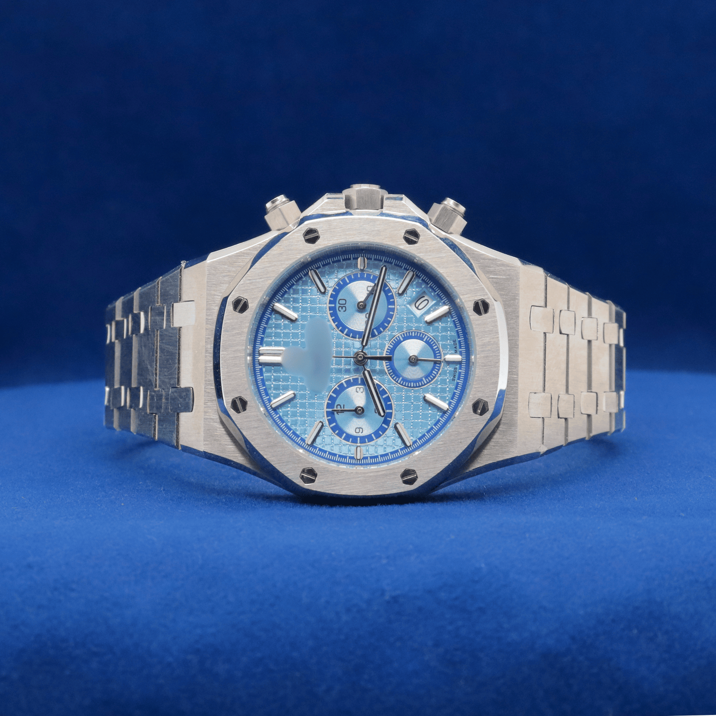 Front view of Silver Steel Blue Chronograph plain stainless steel watch with a bold and modern design.


