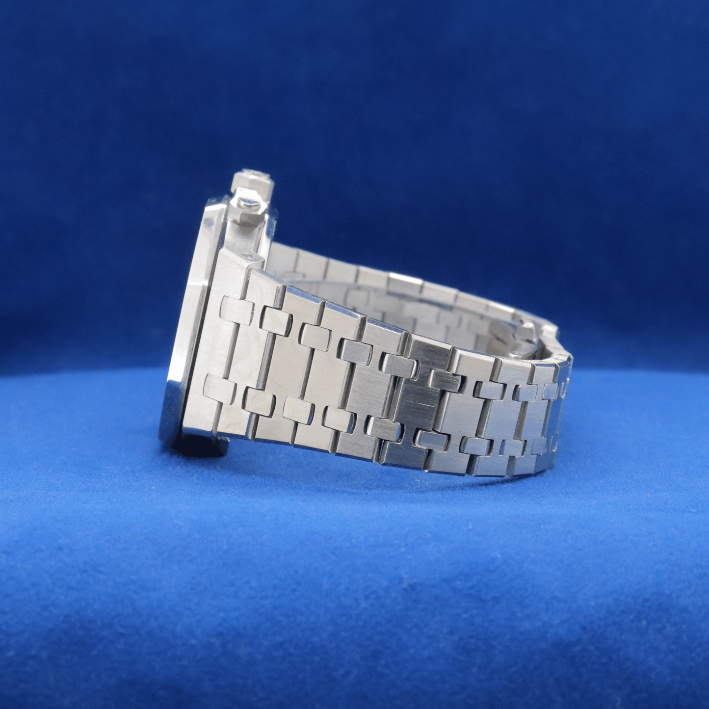 Left-side view of Silver Steel Blue Chronograph plain stainless steel watch, built for durability and style.



