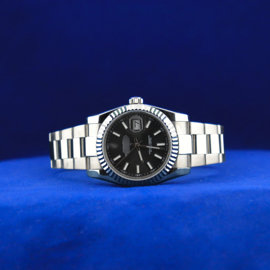 Front view of sleek black dial half iced out custom watch with luxury stainless steel design

