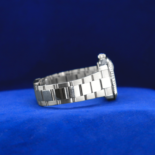 Right side view of sleek black dial watch, half iced out custom style with bold silver accents

