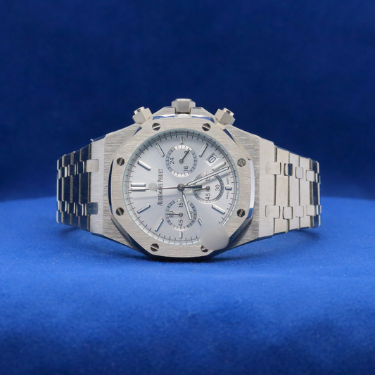 Front view of Snowstorm Chrono plain stainless steel watch with a bold and modern design.


