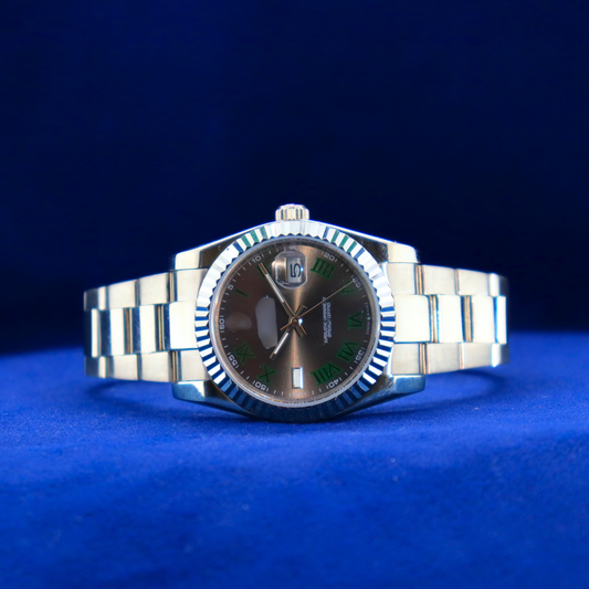Front view of sunburst black-green dial half iced out custom watch with stainless steel case and luxury design

